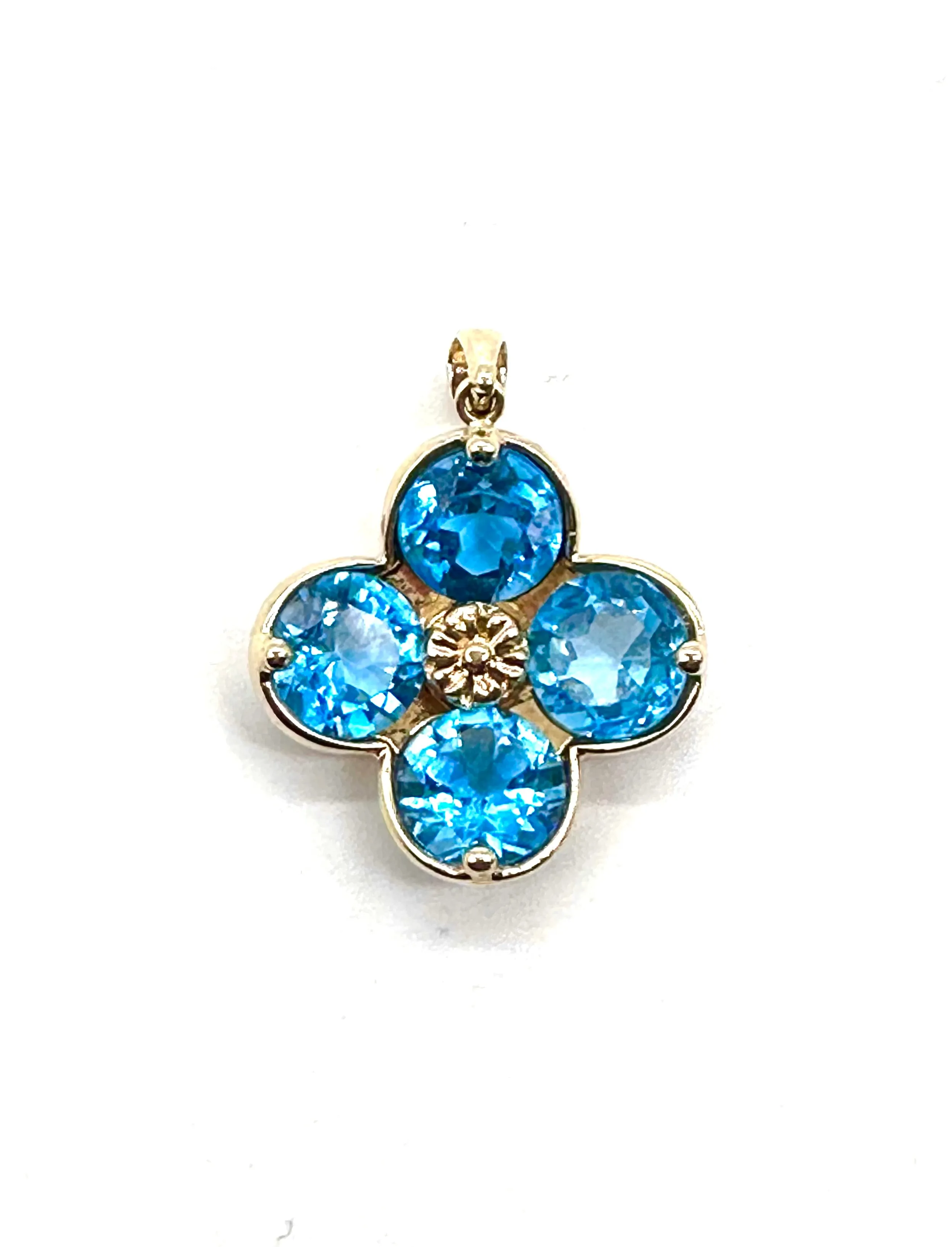 Blue topaz flower pendant