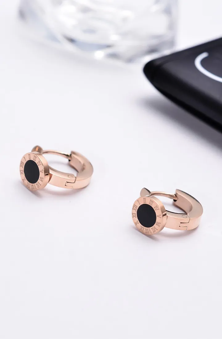 Orla with Round Roman Numeral Rose Gold Huggie Hoop Earrings