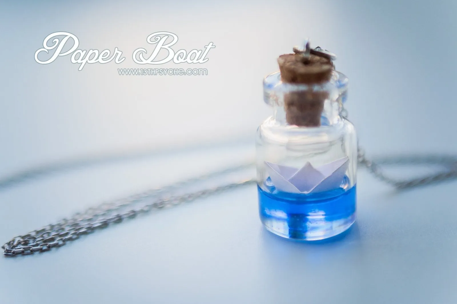 Sterling silver paper boat bottle necklace